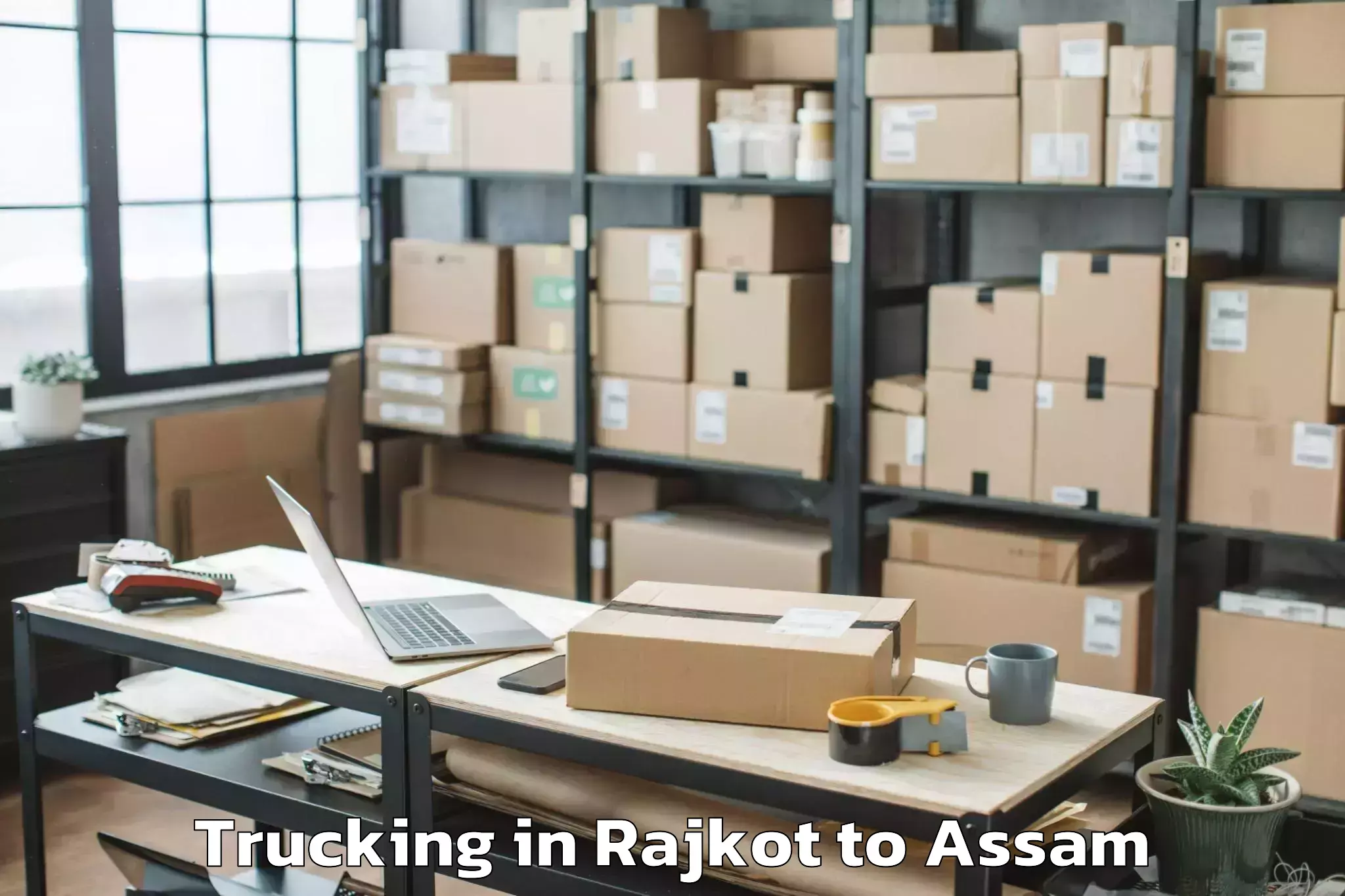 Get Rajkot to Hailakandi Trucking